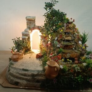 Pesebre con fuente y arco de piedra